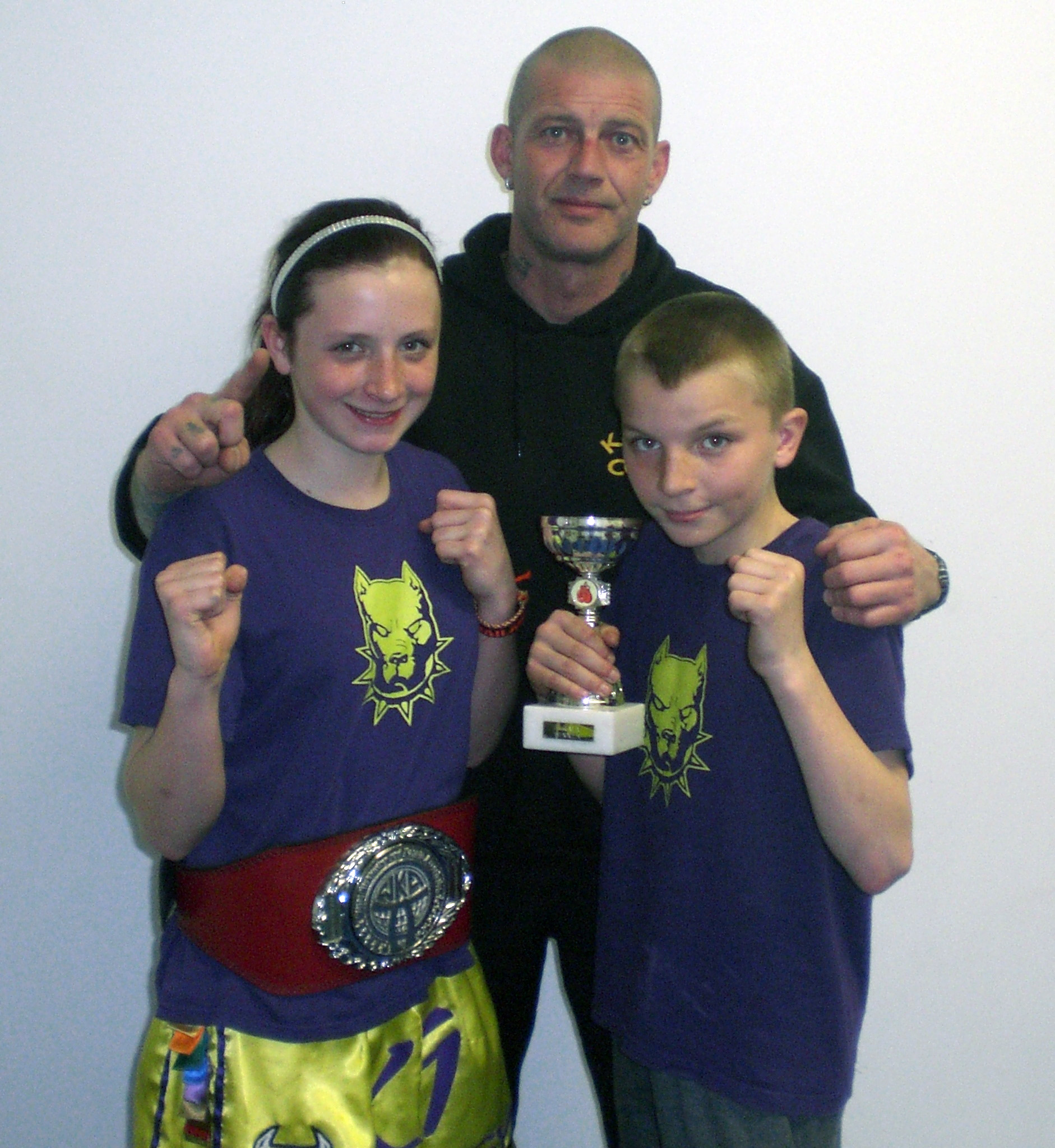 New National Schoolgirl Champion Tia Sayer with Coach Dave Munro and fighter of the night Nicky McHugh